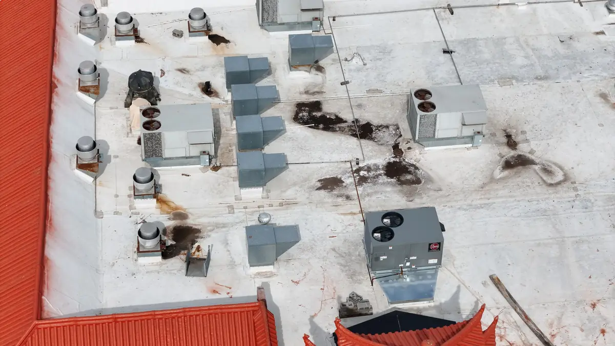 Commercial flat / low-slope (TPO) roof with rooftop HVAC in Middle Tennessee, serviced by Blue Raider Roofing.