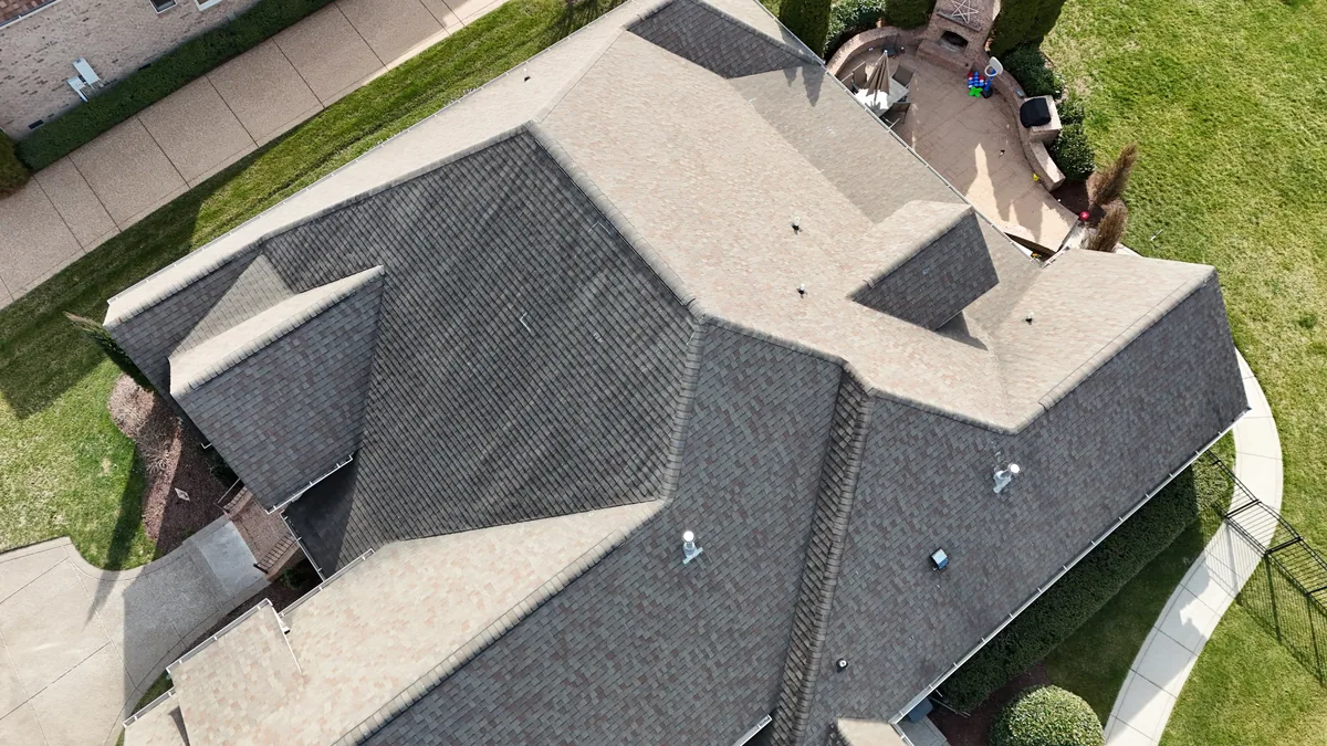 Aerial drone roof-inspection photo of a home in Brentwood, TN by Blue Raider Roofing
