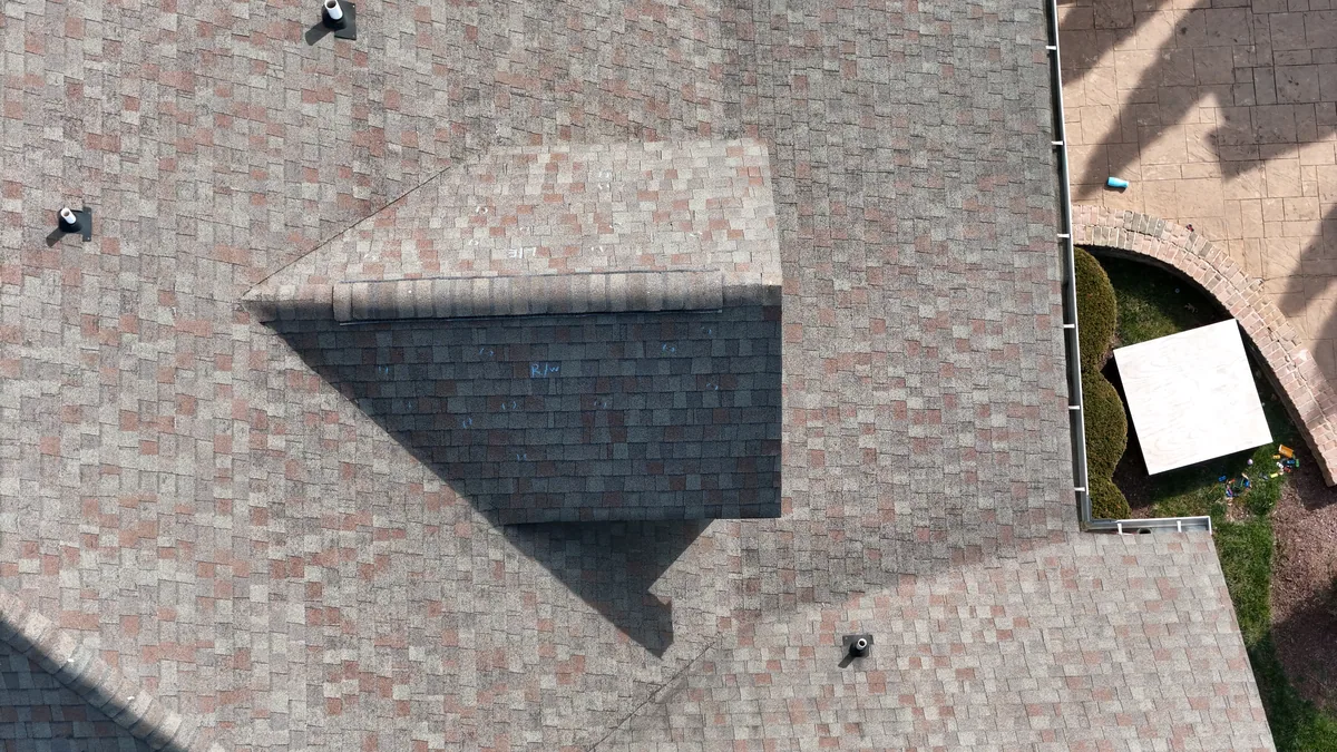 Aerial drone roof-inspection photo of a home in Brentwood, TN by Blue Raider Roofing