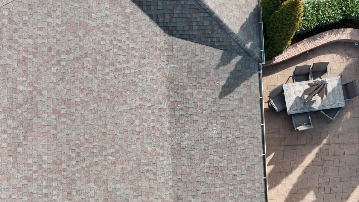 Aerial drone roof-inspection photo of a home in Brentwood, TN by Blue Raider Roofing