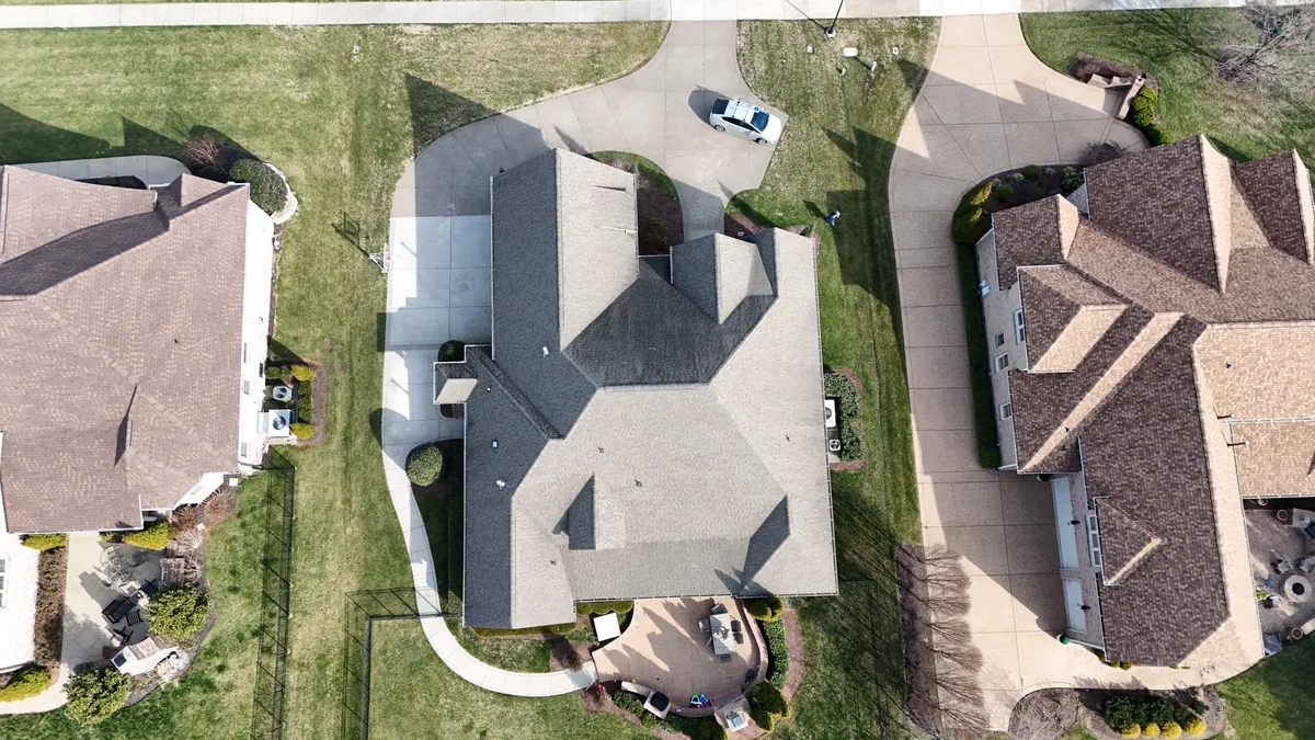 Aerial drone roof-inspection photo of a home in Brentwood, TN by Blue Raider Roofing