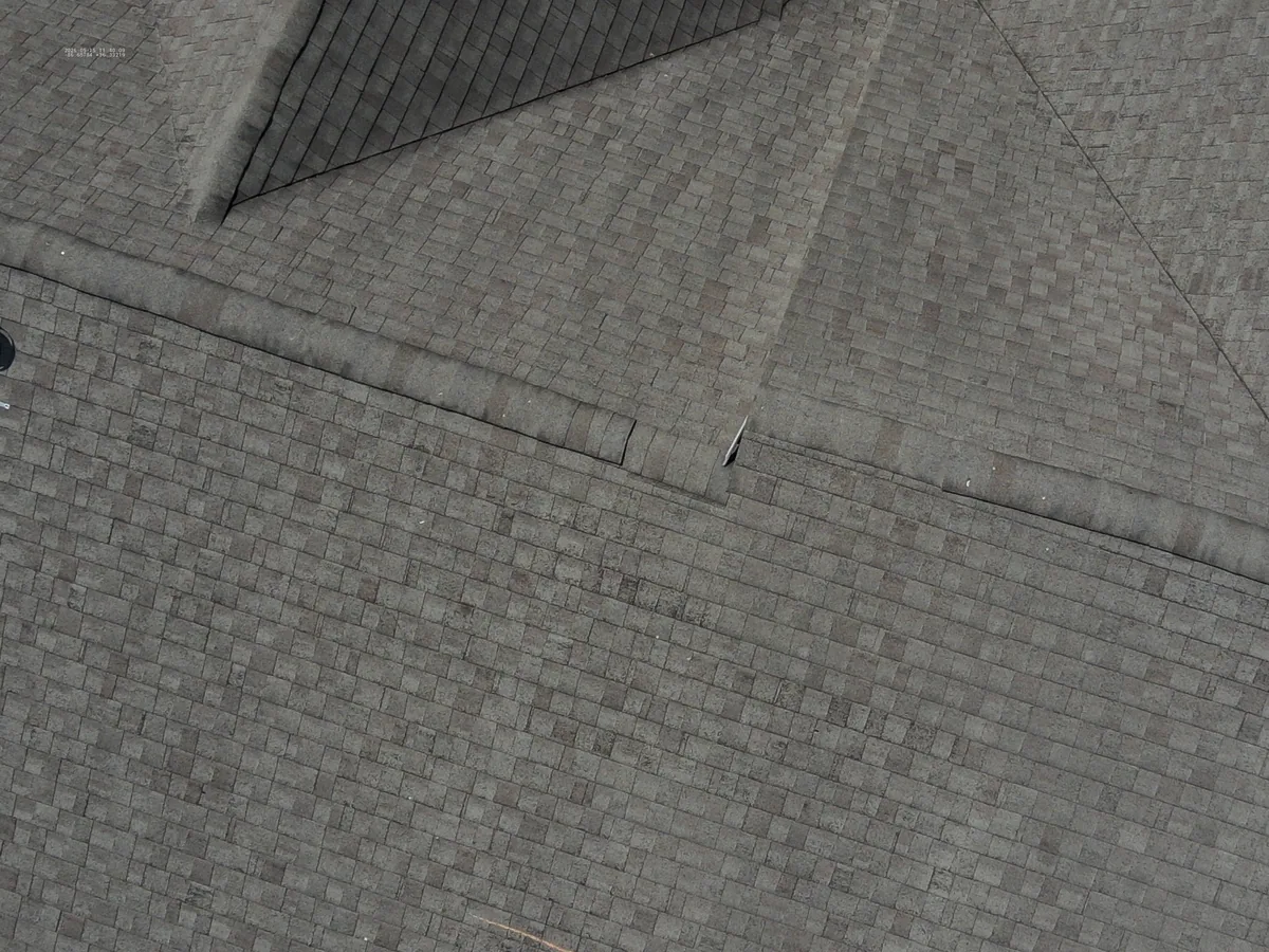 Close drone view of shingles and ridge on a Hendersonville, TN roof