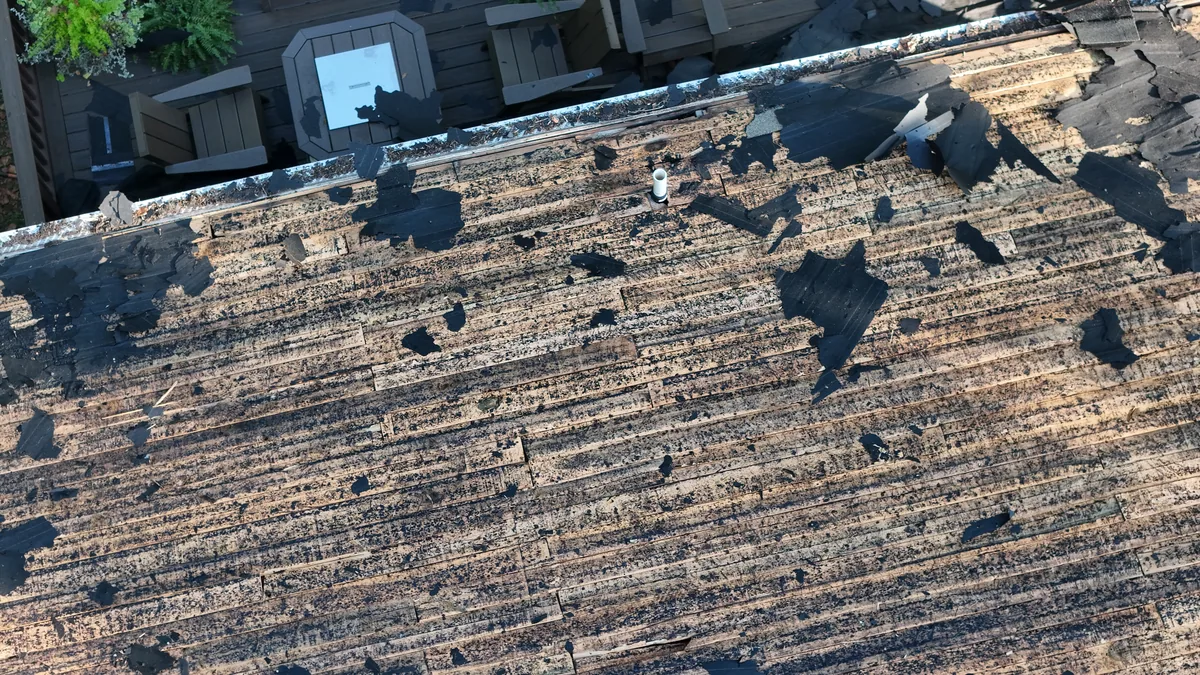 Original plank decking exposed during a roof replacement in McMinnville, TN