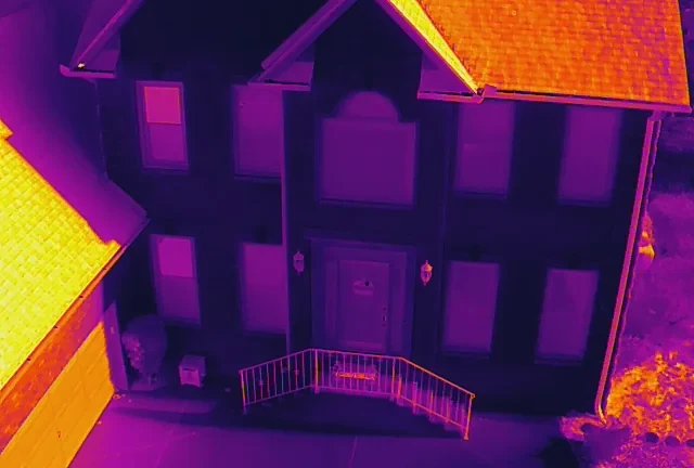 Aerial thermal image of a brick Murfreesboro, TN home's roof from a drone inspection