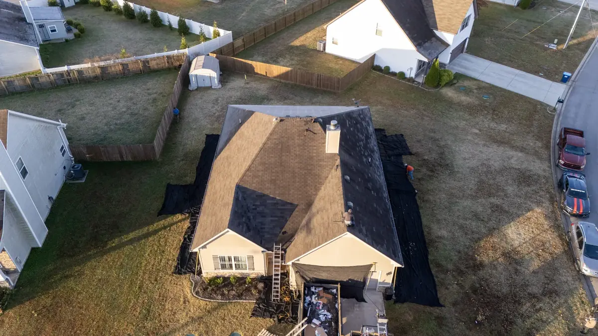 Aerial drone roof-inspection photo over R T Estates, Tennessee by Blue Raider Roofing & Contracting