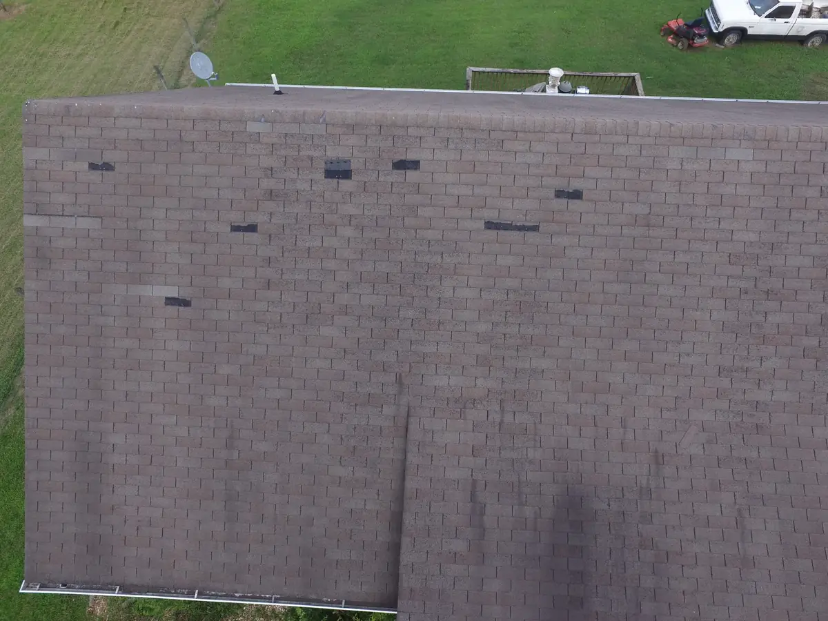 Aerial drone roof-inspection photo over Rover, Tennessee by Blue Raider Roofing & Contracting