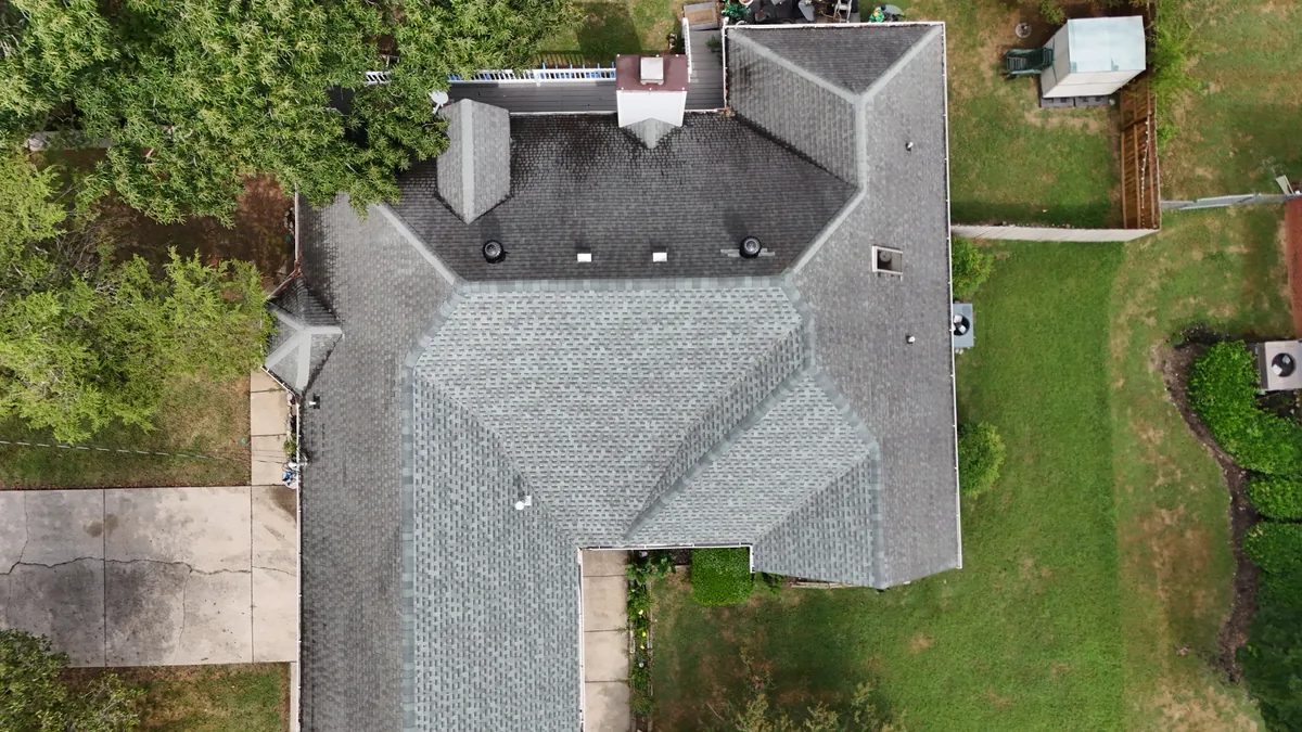 Aerial drone roof-inspection photo over Smyrna, Tennessee by Blue Raider Roofing & Contracting