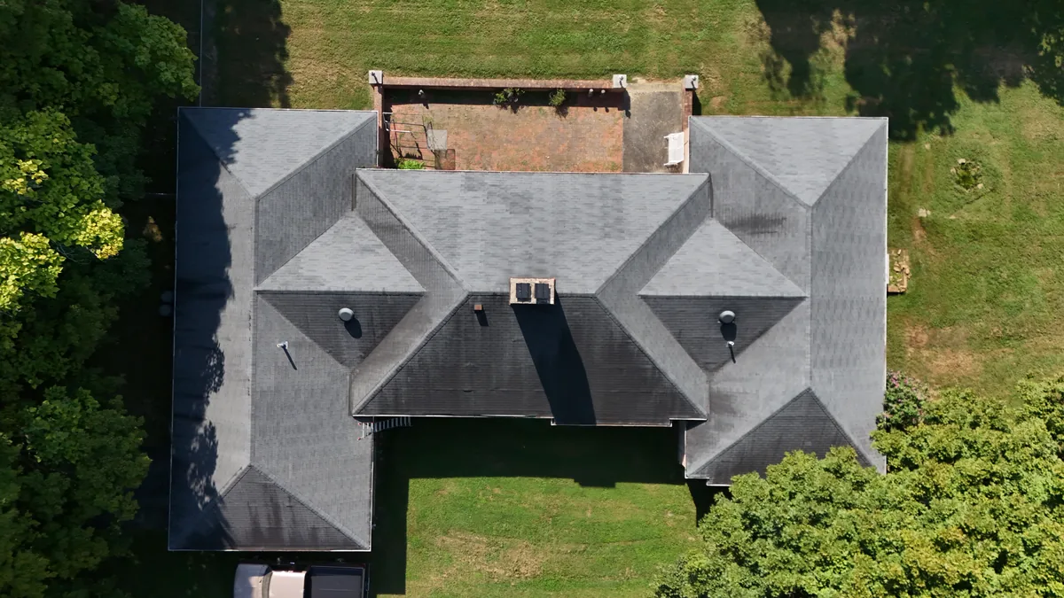 Aerial drone roof-inspection photo over Summitville, Tennessee by Blue Raider Roofing & Contracting