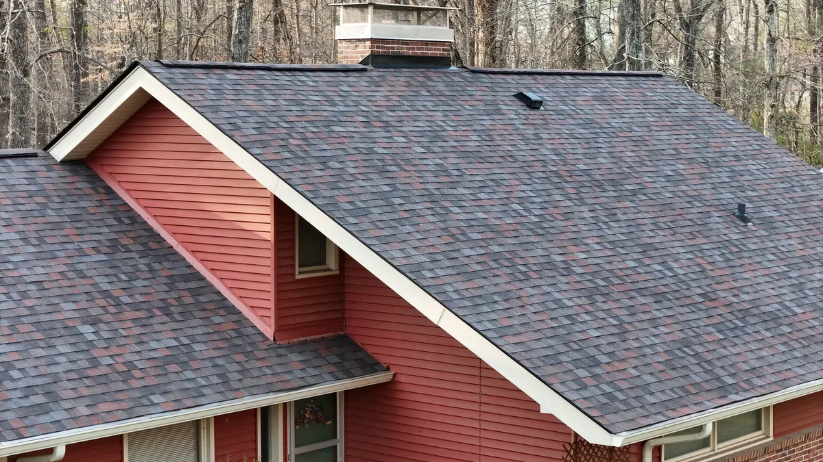 The same red-sided Tullahoma, TN home with its completed new shingle roof