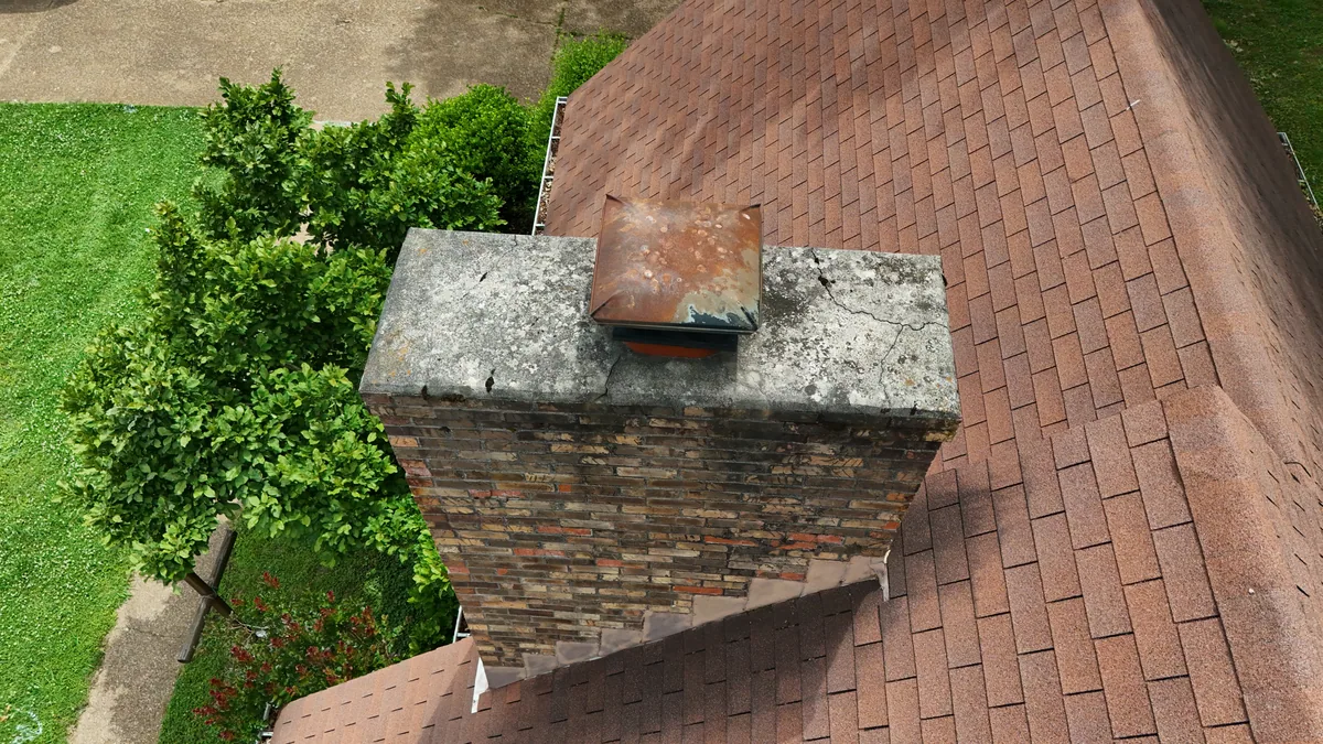 Stone chimney and cap inspected by drone on a Rutherford County, TN roof