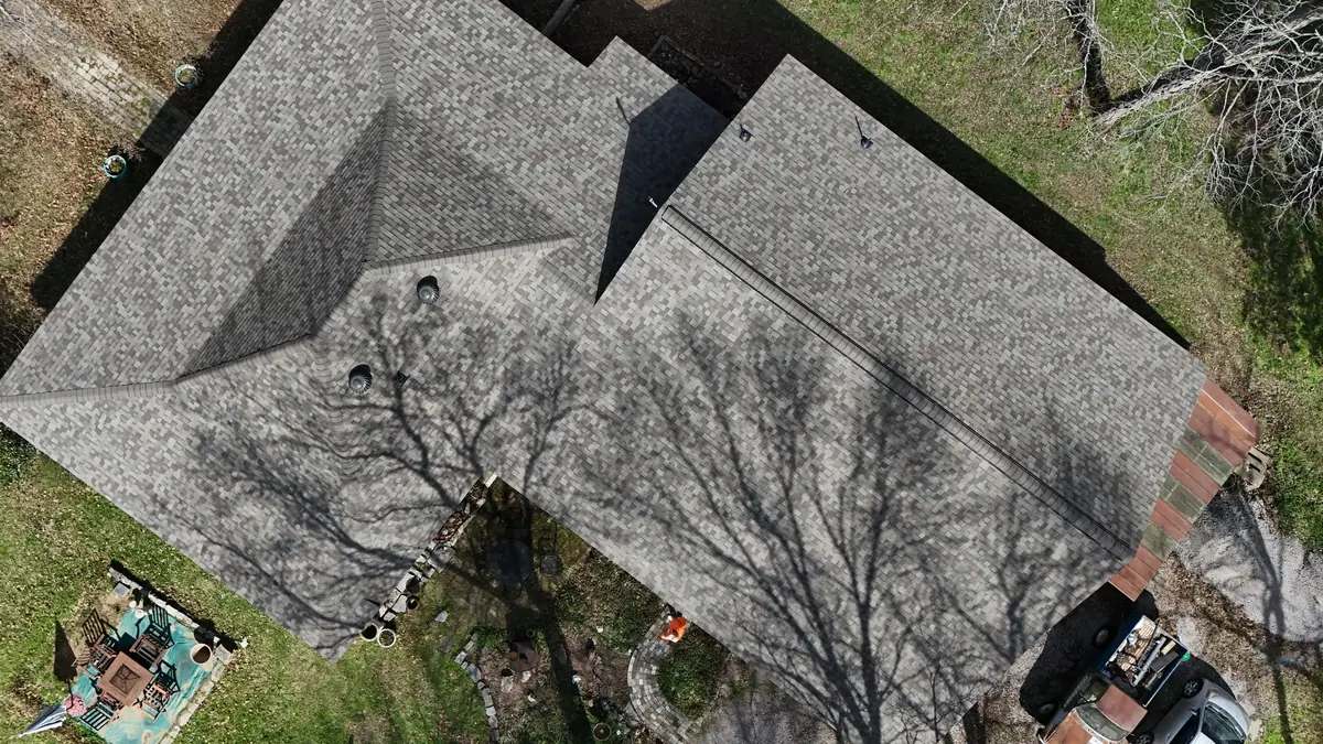 Aerial drone photograph of a residential roof in Lewisburg, TN, captured by Blue Raider Roofing during an FAA Part 107 roof inspection.
