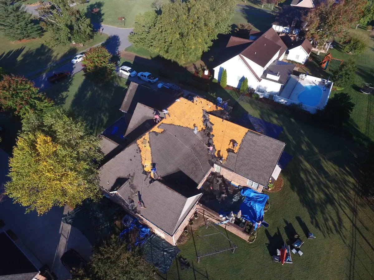 Aerial drone photograph of a residential roof in Tullahoma, TN, captured by Blue Raider Roofing during an FAA Part 107 roof inspection.