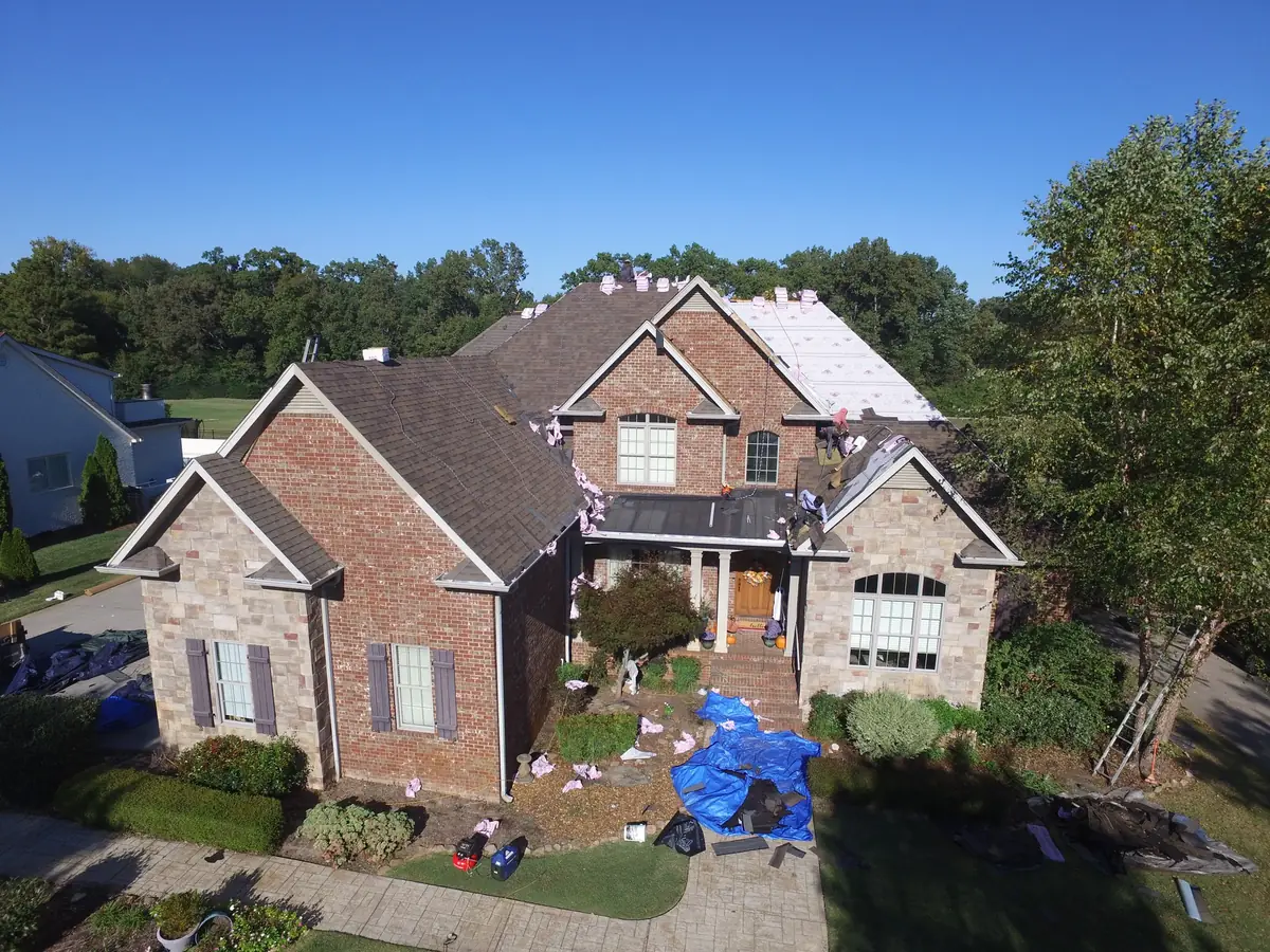 Aerial drone photograph of a residential roof in Tullahoma, TN, captured by Blue Raider Roofing during an FAA Part 107 roof inspection.