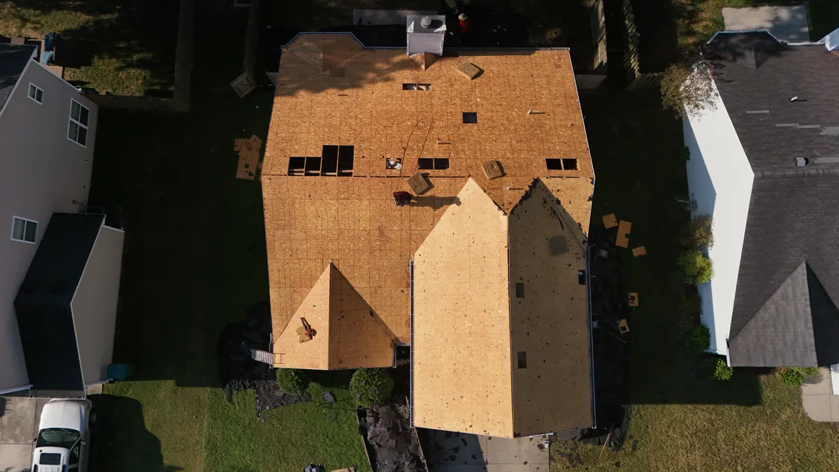 Roof tear-off complete with decking exposed on a Smyrna, TN home, morning of September 17, 2026