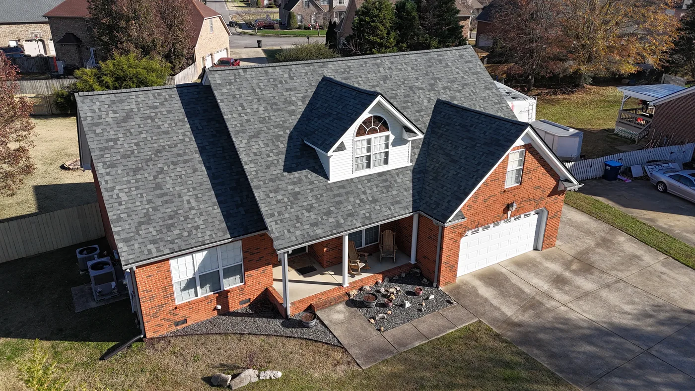 Seamless gutters along the eaves of a finished roof in Middle Tennessee