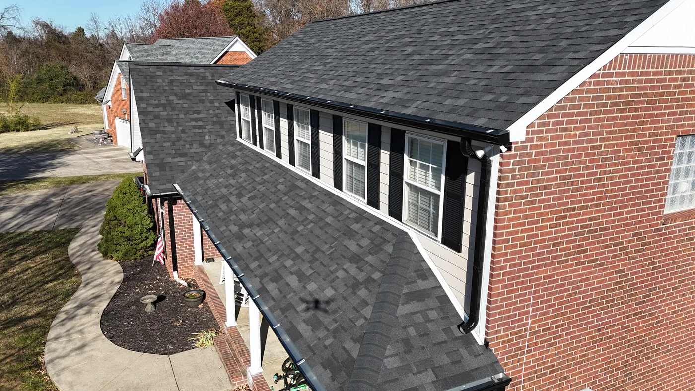 Lap siding and shutters on a completed Blue Raider exterior