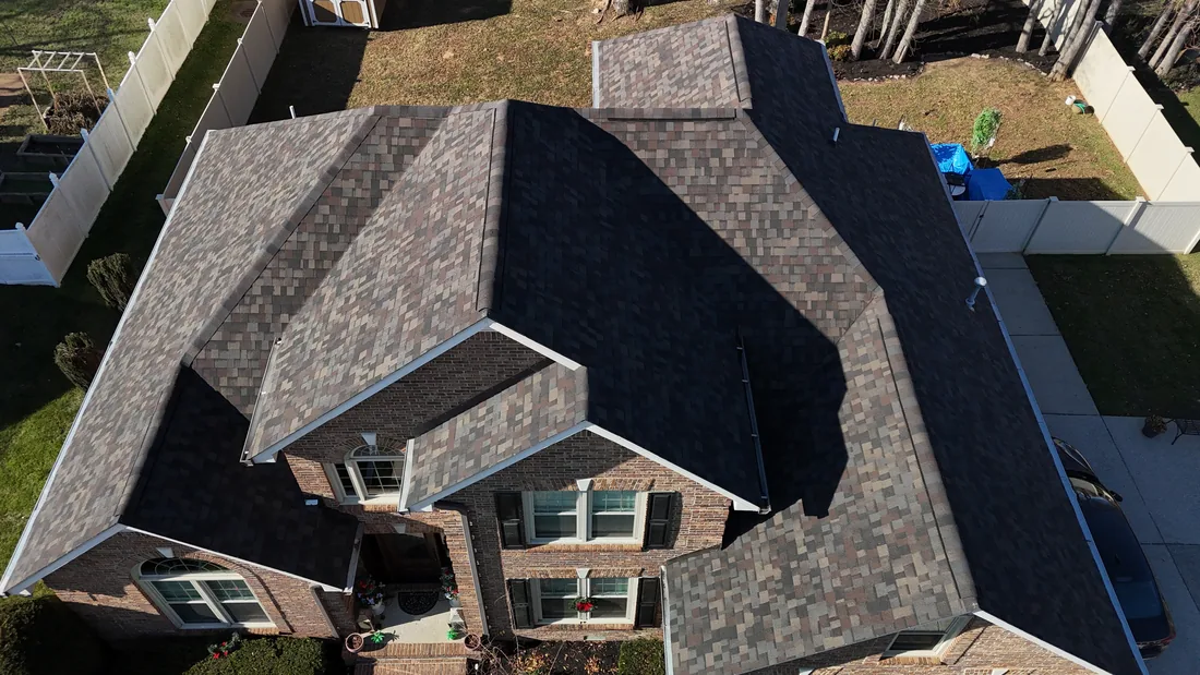 Designer shingle roof on a brick home